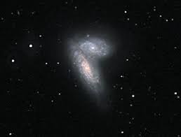 Siamská dvojčata dvojice spirálních galaxií NGC 4567 a NGC 4568